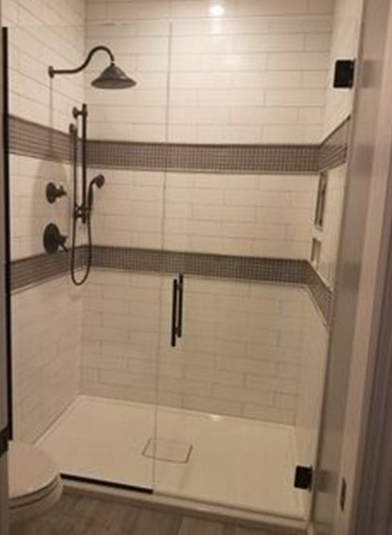 Bathroom remodel with subway tiles and waterfall showerhead