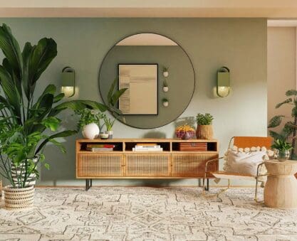 living room with big round statement mirror