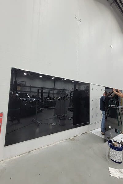 Installation of black glass panels