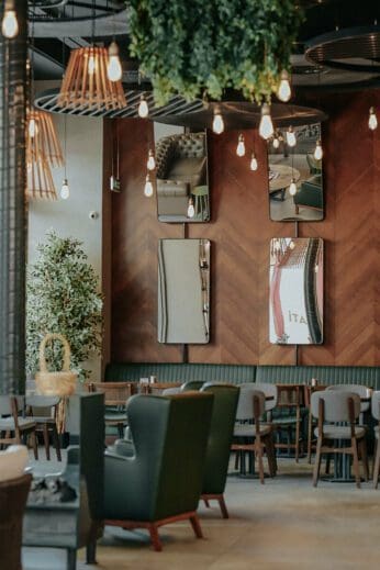 coffee shop with mirros on wall to add dimension coffee shop with mirrors on wall to add dimension to room