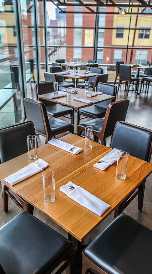 resturant dining tables restaurant with a view and beautiful refinished tables.